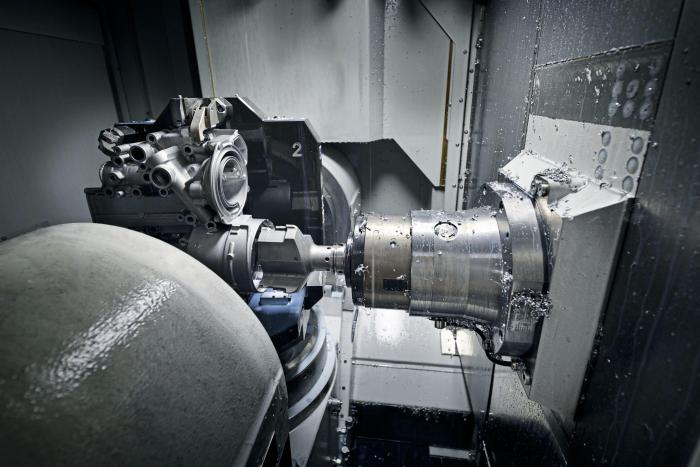 图1 Metalli公司开始在两台Heckert加工中心上加工简单的机油滤清器体了。十分之一的产品已经开始自己加工